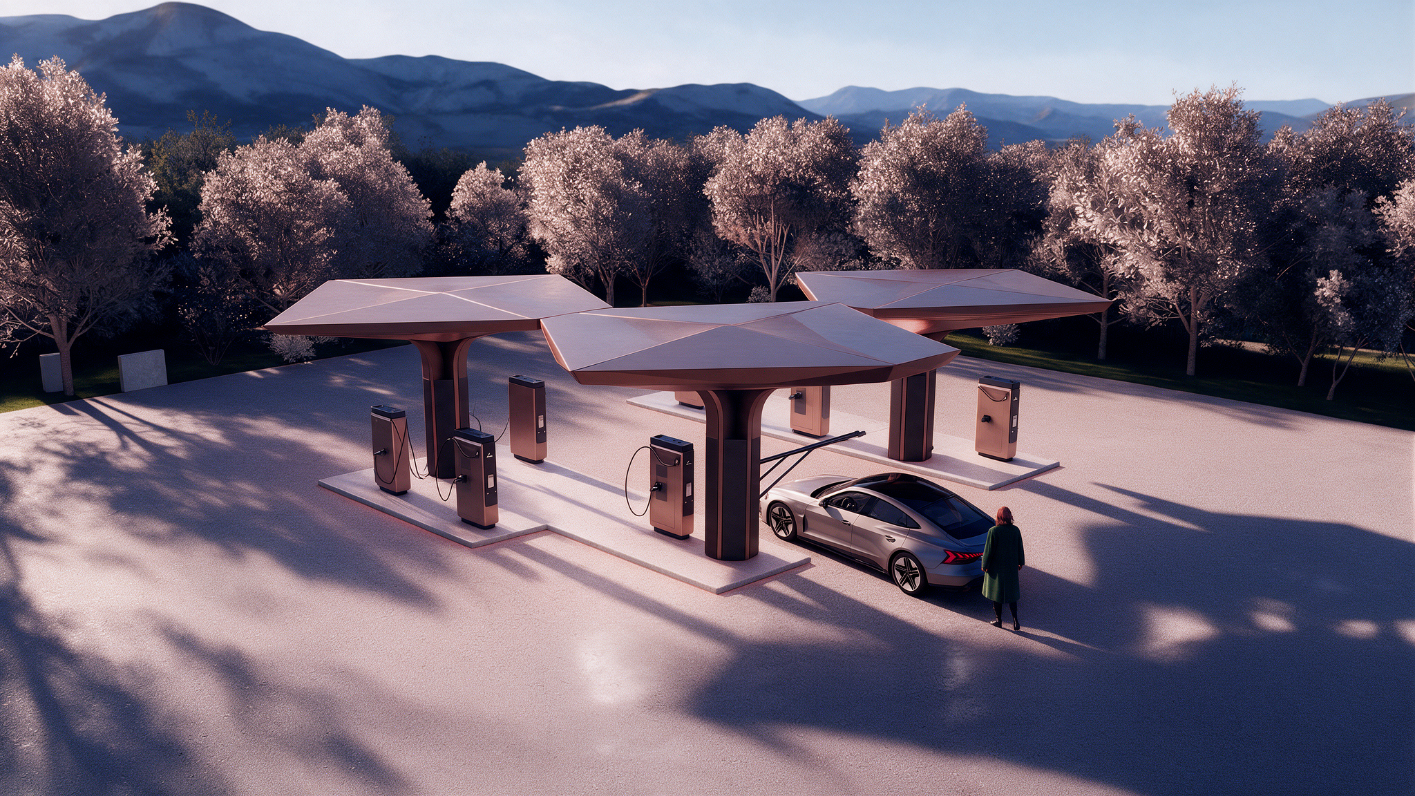 Aerial view of an EV charging hub with battery storage: copper canopies, fast chargers and a car charging